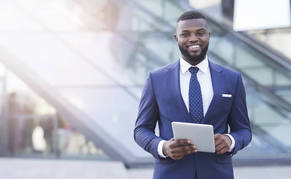 depositphotos_295460482-stock-photo-cheerful-african-american-businessman-holding